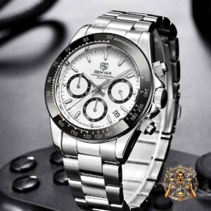 Reloj Beynar BY-5169 Blanco para Hombre - Estilo y Funcionalidad en su Máxima Expresión Descubre el Reloj Beynar BY-5169 Blanco para Hombre, la combinación perfecta de estilo moderno y funcionalidad robusta. Este reloj de pulsera es ideal para el hombre que busca un accesorio elegante y resistente para cualquier ocasión. Especificaciones del Reloj Beynar BY-5169: Grosor de la Caja: 12 mm Ancho de Banda: 20 mm Material de la Correa: Acero inoxidable (Stainless Steel), proporcionando durabilidad y un acabado elegante. Forma de la Caja: Redonda, ofreciendo un diseño clásico y atemporal. Material de la Cubierta del Dial: Hardlex, conocido por su resistencia a los arañazos. Material de la Caja: Aleación (Alloy), garantizando robustez y ligereza. Diámetro del Dial: 40 mm, ideal para un look moderno y sofisticado. Tipo de Cierre: Cierre de pulsera, seguro y fácil de ajustar. Longitud de Banda: 22 cm, adaptándose cómodamente a la mayoría de las muñecas. Funciones Principales: Resistente a los Golpes: Diseñado para soportar condiciones exigentes. Cronógrafo: Perfecto para medir tiempos con precisión. Calendario Completo: Mantén el control de todas tus fechas importantes. Buzo: Resistente hasta 3 bar, ideal para actividades acuáticas. Manecillas Luminosas: Para una mejor visibilidad en la oscuridad. Resistente al Agua: Hasta 3 bar, adecuado para nadar y uso diario. Movimiento: Cuarzo (Quartz), conocido por su alta precisión y fiabilidad. Estilo: A la moda y casual, adecuado para cualquier ocasión. Marca: BENYAR, sinónimo de calidad y diseño. Origen: China (CN), asegurando estándares de fabricación de alta calidad. El Reloj Beynar BY-5169 Blanco para Hombre no solo es un accesorio elegante, sino también una herramienta práctica para el hombre moderno. Con su diseño robusto y múltiples funciones, es la elección perfecta para quienes valoran tanto la estética como la funcionalidad. Compra ahora y disfruta de un reloj que combina lo mejor de ambos mundos.